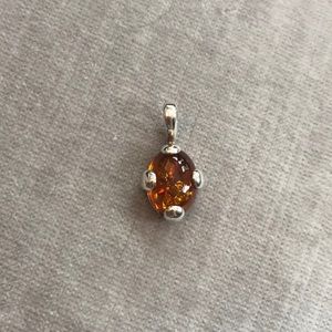 Amber and silver pendant